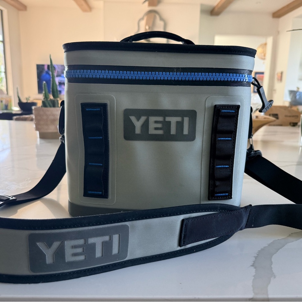 Yeti Tan Duffel-Style Soft Cooler with Black Trim and Blue Zipper